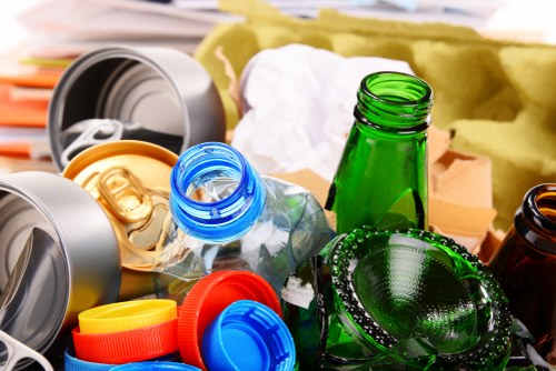 Experienced clearance professionals organizing items for recycling